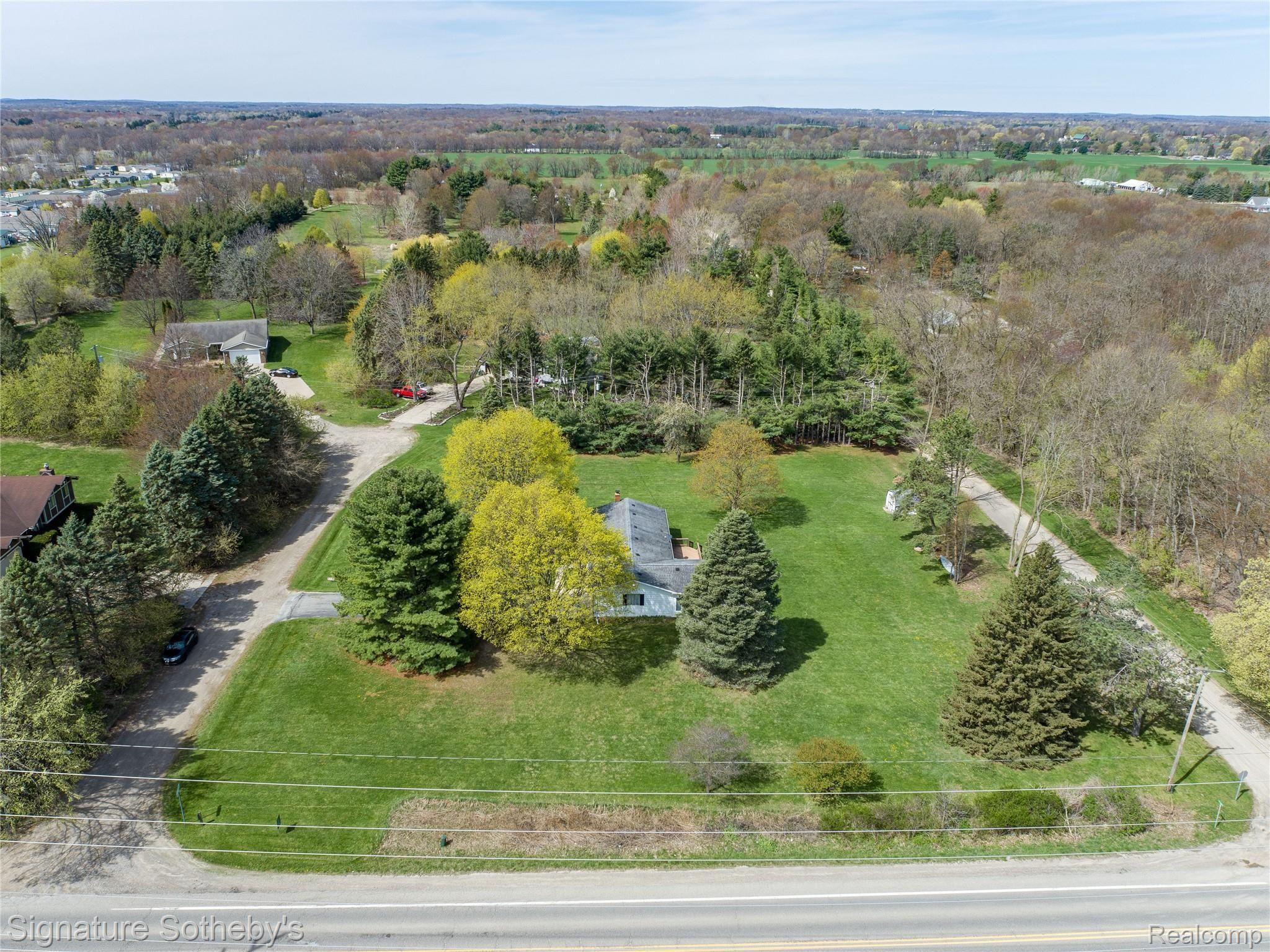 2500 South Hickory Ridge Road Milford, MI 48380 - Photo 1 of 40 Milford Twp. ranch on acreage with finished basement & sunroom