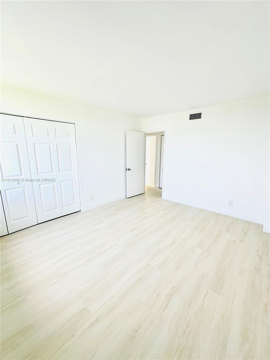 9001 Southwest 77th Avenue, Unit C608 Miami, FL 33156 - Photo 12 of 15 a view of an empty room