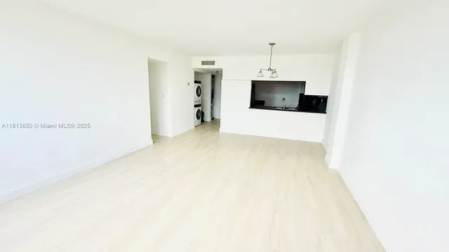 a view of a livingroom and a fireplace