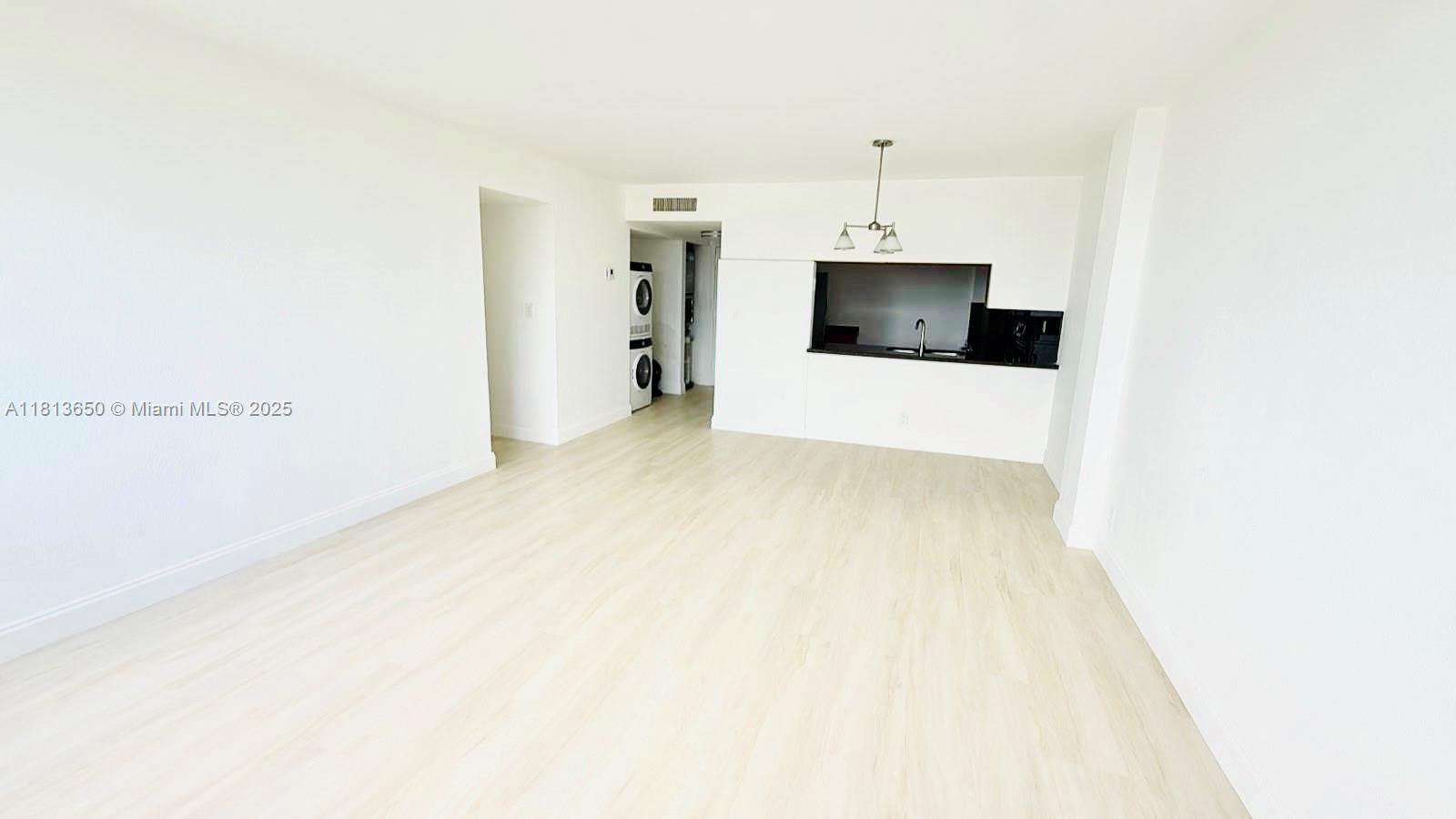 9001 Southwest 77th Avenue, Unit C608 Miami, FL 33156 - Photo 2 of 15 a view of a livingroom and a fireplace