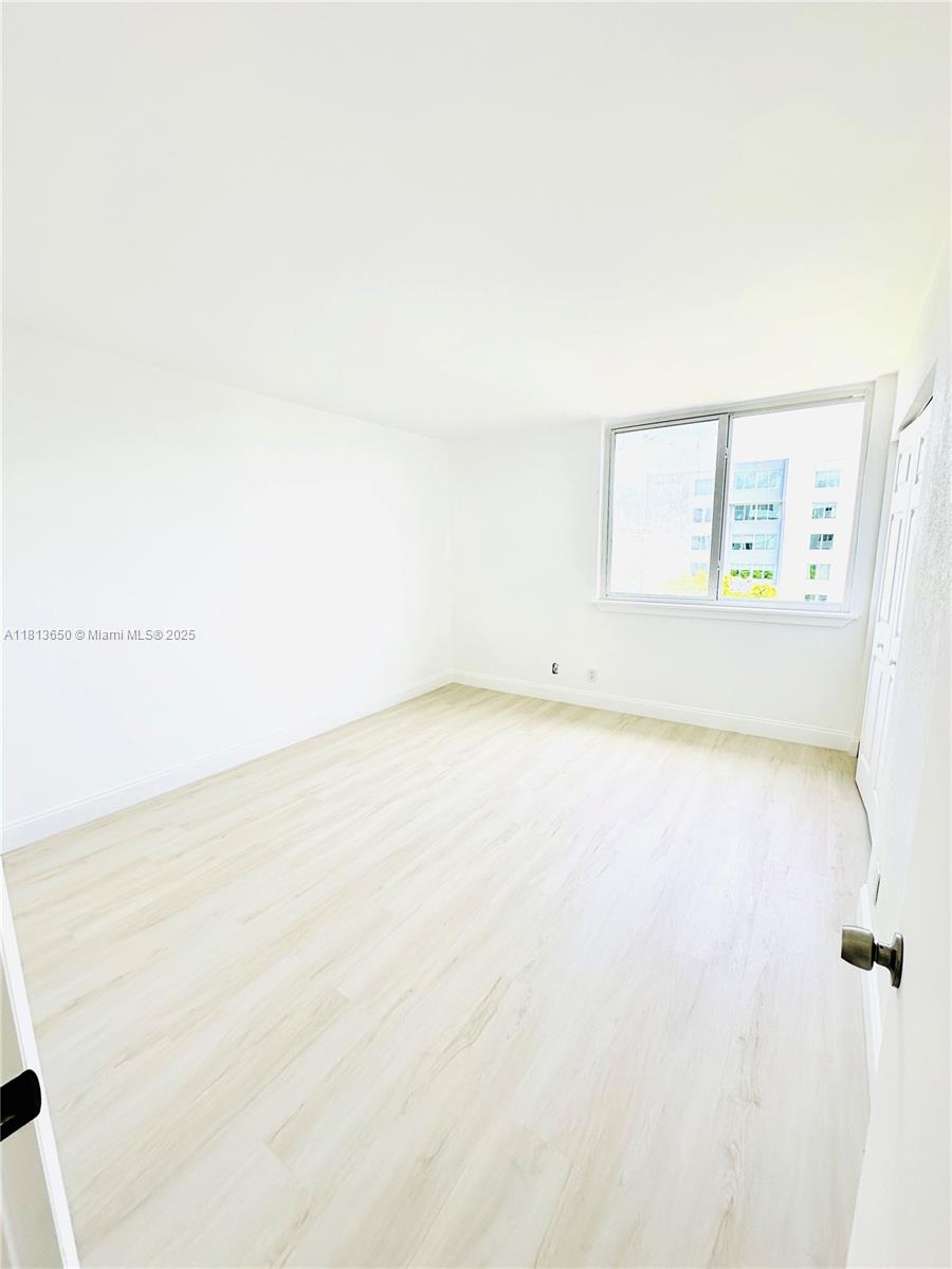 9001 Southwest 77th Avenue, Unit C608 Miami, FL 33156 - Photo 7 of 15 a view of a refrigerator in a room