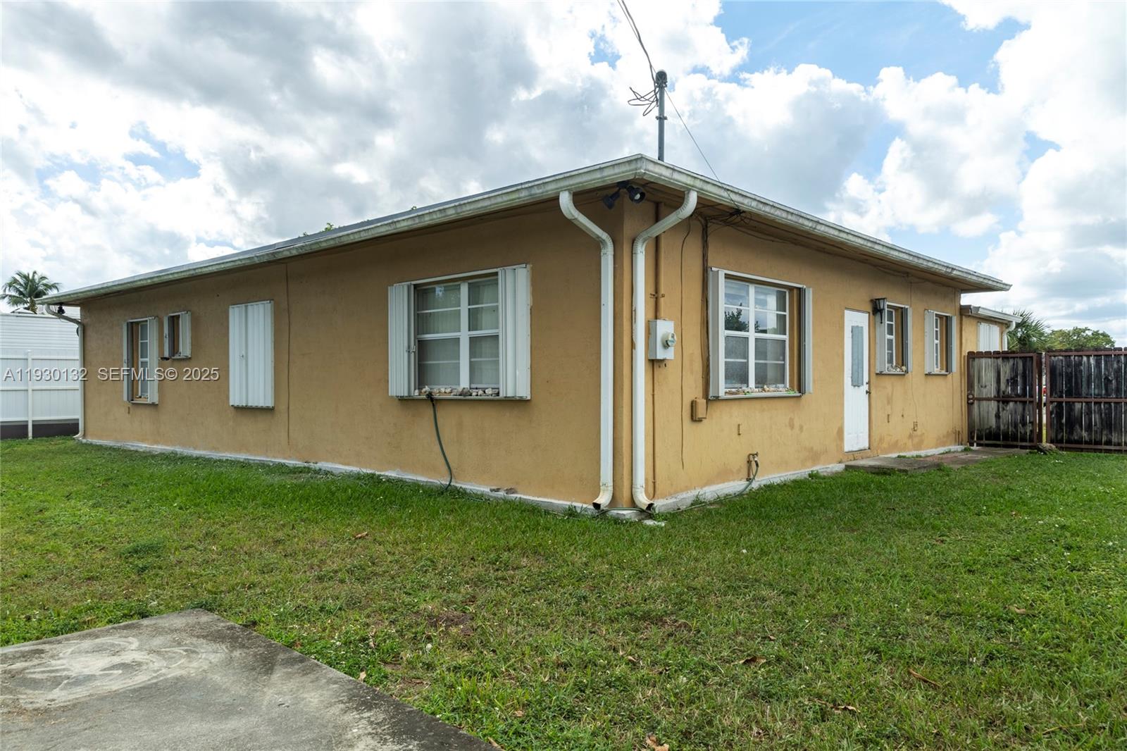 a front view of a house with yard