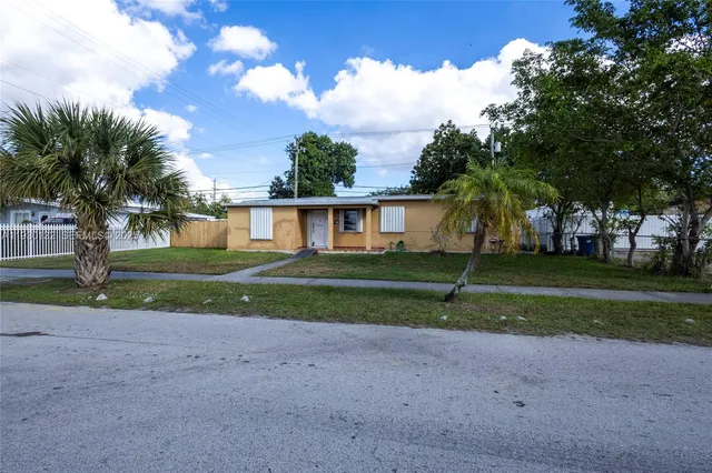a view of backyard with green space