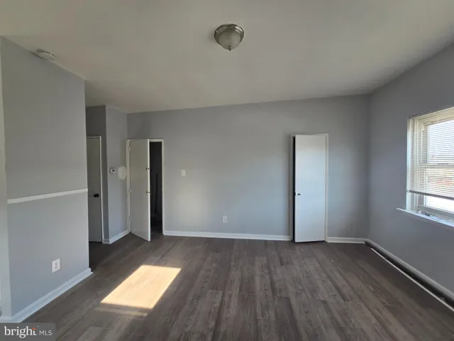 a kitchen with stainless steel appliances a refrigerator sink and cabinets