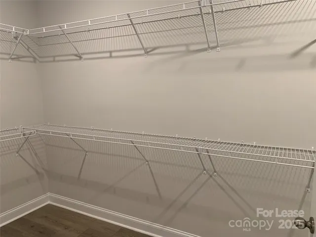 a view of a room with racks on the wall