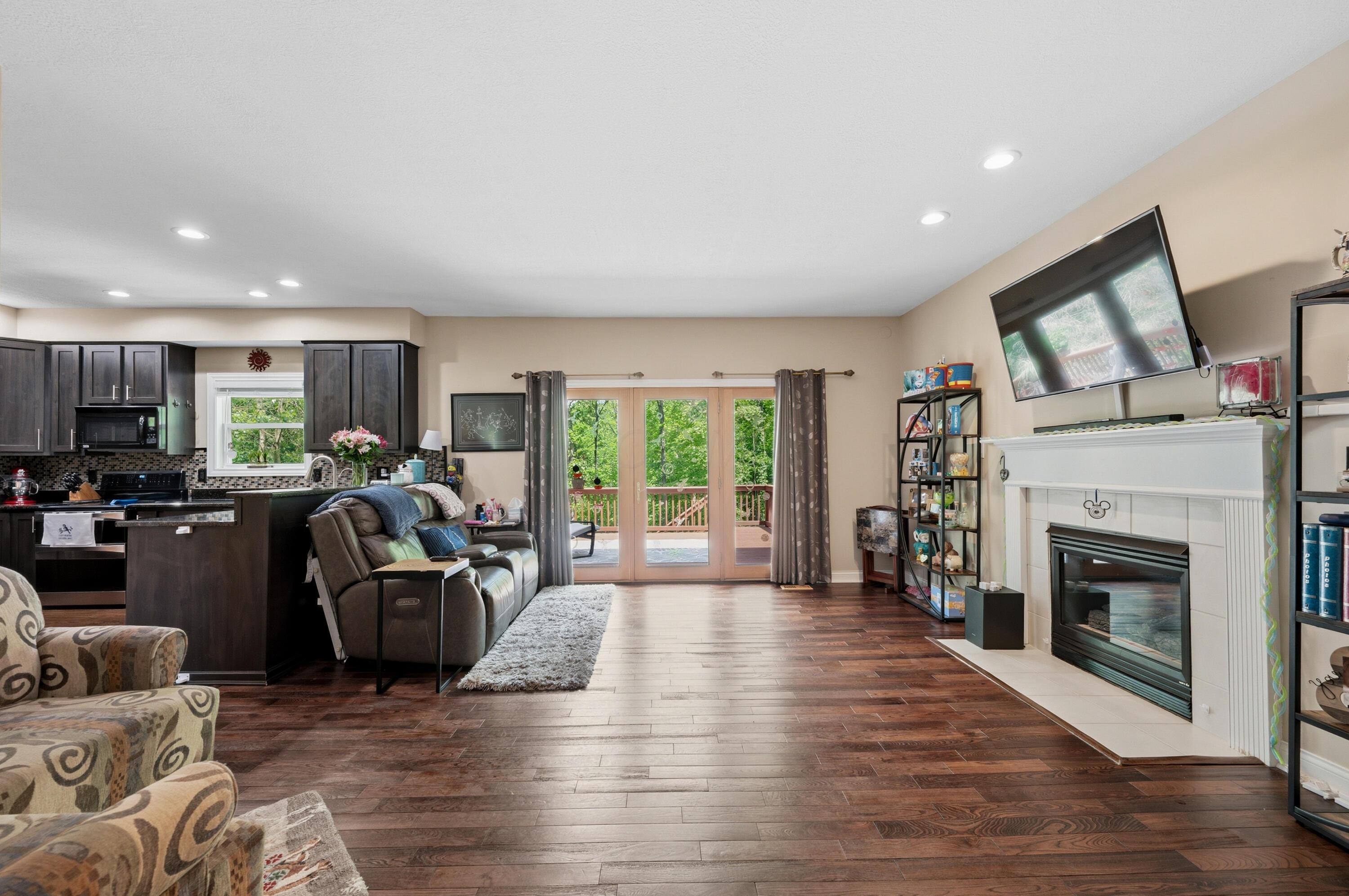 11557 Palmer Road Mount Perry, OH 43760 - Photo 23 of 68 Great Room To Deck & Kitchen