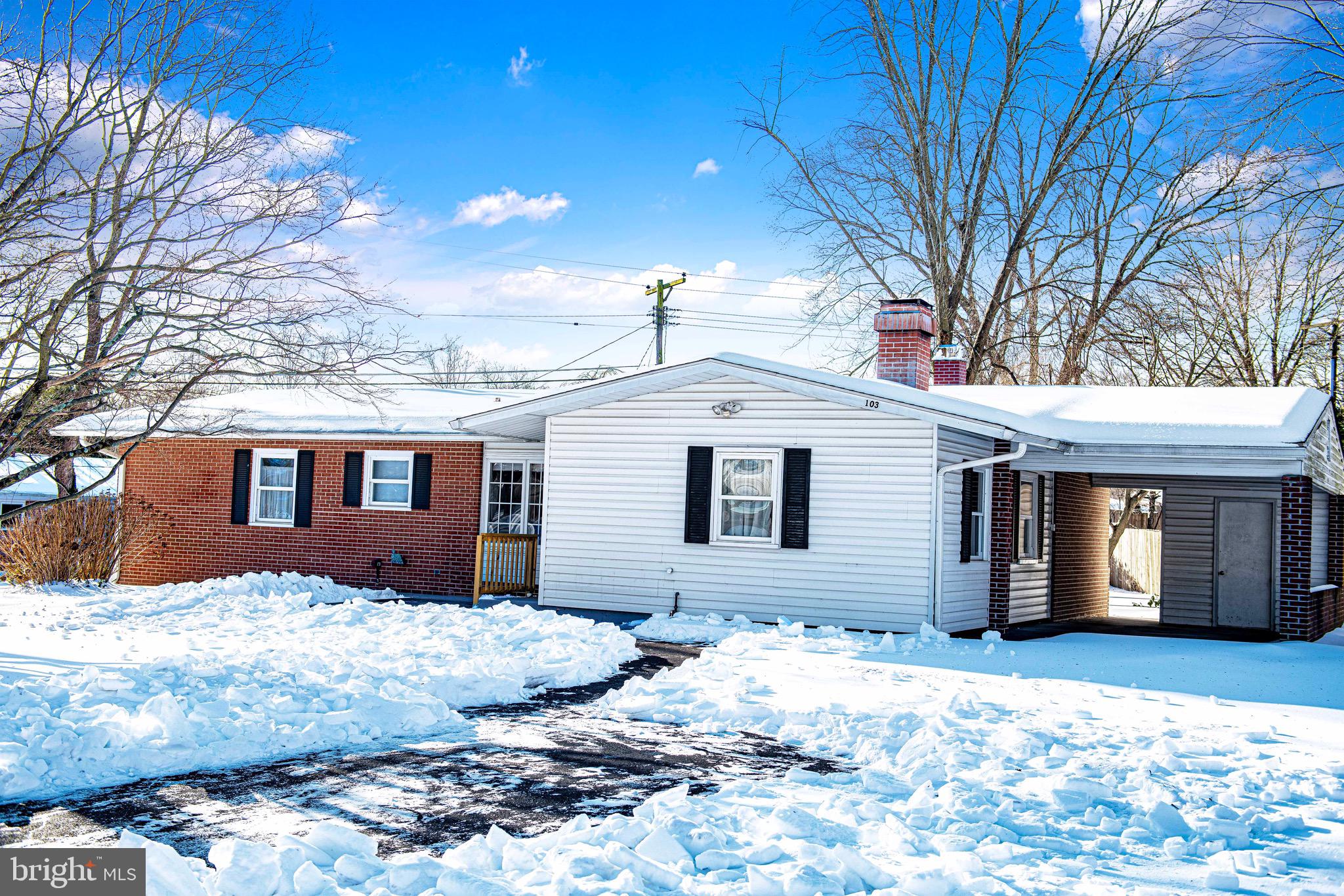 103 Chatham Road Bel Air, MD 21014 - Photo 21 of 21 a front view of a house with a yard covered in snow