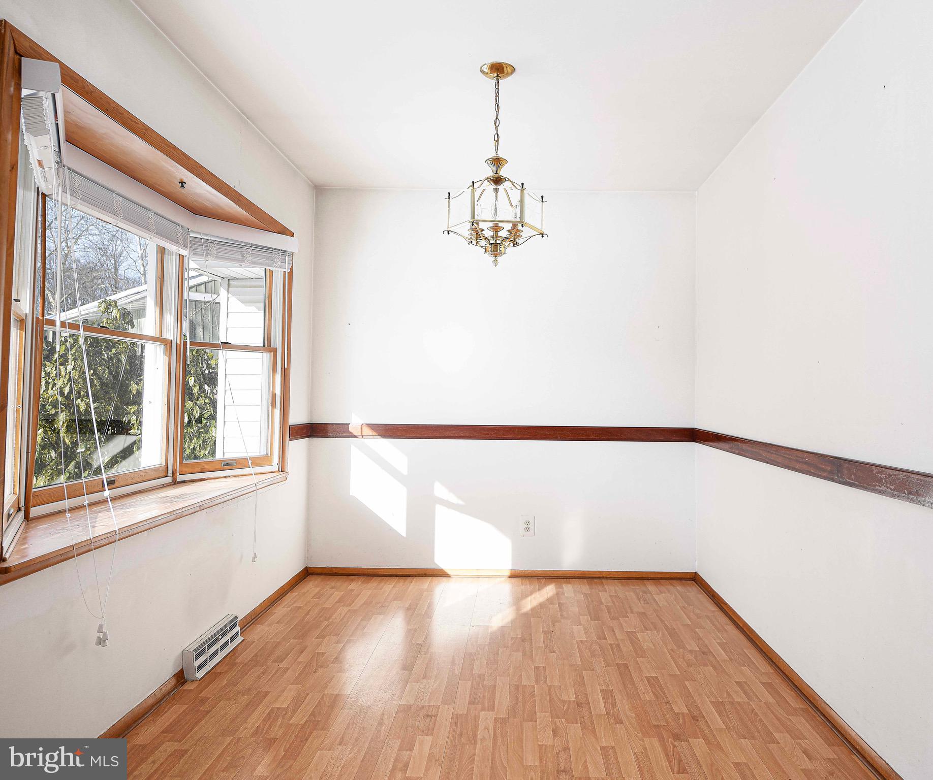103 Chatham Road Bel Air, MD 21014 - Photo 6 of 21 a view of empty room with wooden floor and fan