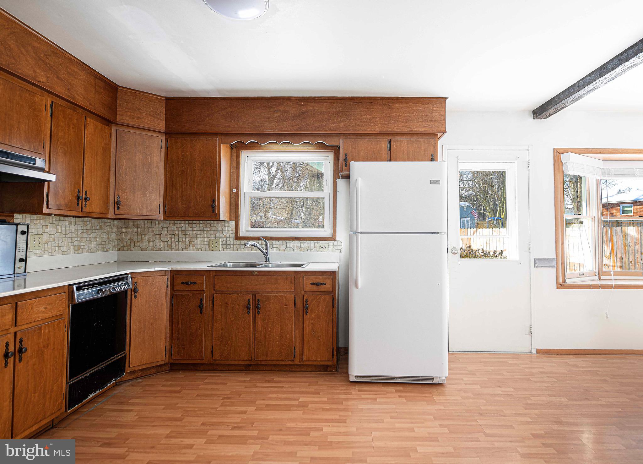 103 Chatham Road Bel Air, MD 21014 - Photo 8 of 21 a white refrigerator freezer sitting inside of a kitchen