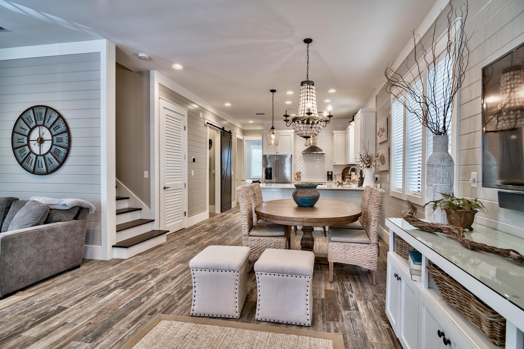 33 West Seacrest Beach Blvd Inlet Beach Inlet Beach, FL 32461 - Photo 1 of 53 a living room with furniture and a chandelier