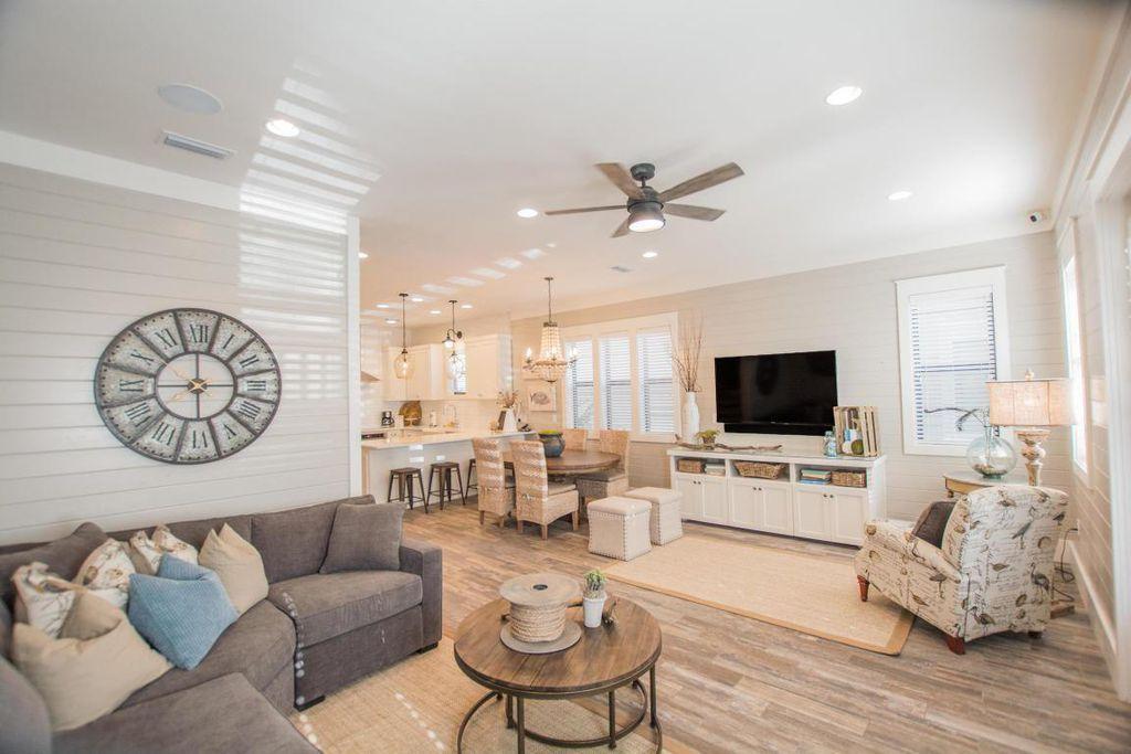 33 West Seacrest Beach Blvd Inlet Beach Inlet Beach, FL 32461 - Photo 11 of 53 a living room with furniture and a flat screen tv