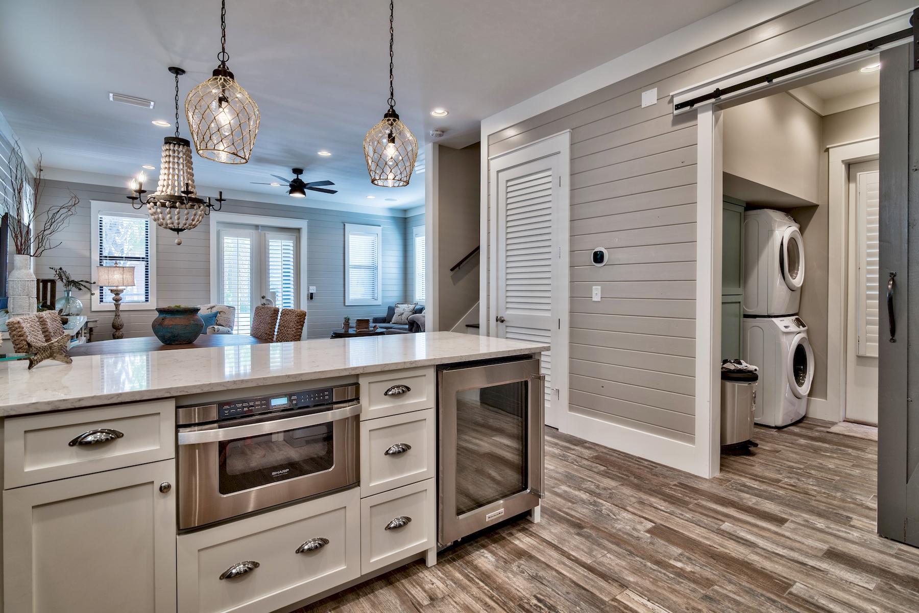 33 West Seacrest Beach Blvd Inlet Beach Inlet Beach, FL 32461 - Photo 5 of 53 a kitchen with stainless steel appliances a stove and cabinets
