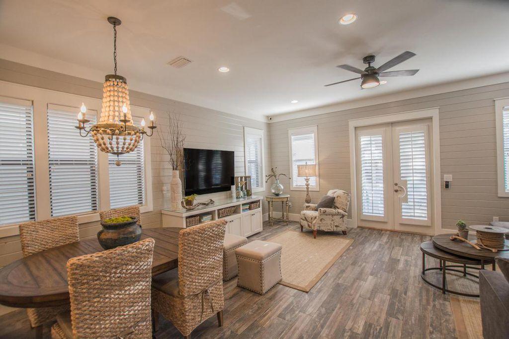 33 West Seacrest Beach Blvd Inlet Beach Inlet Beach, FL 32461 - Photo 8 of 53 a living room with furniture and a flat screen tv