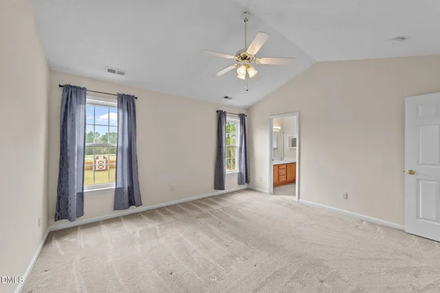 a view of an empty room with window