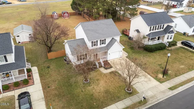 with aerial view of residential houses with outdoor space