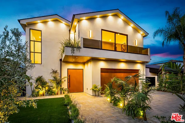 a view of a house with a swimming pool