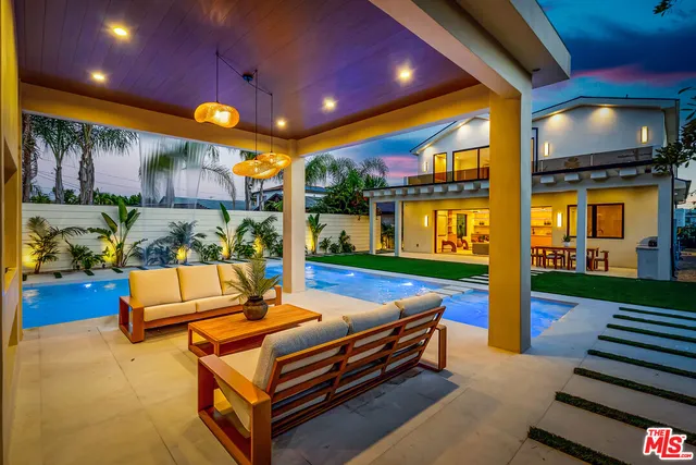 a utility room with sink dryer and washer