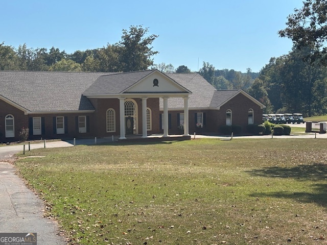 128 Greenview Terrace Macon, GA 31220 - Photo 4 of 10 a front view of a house with a yard