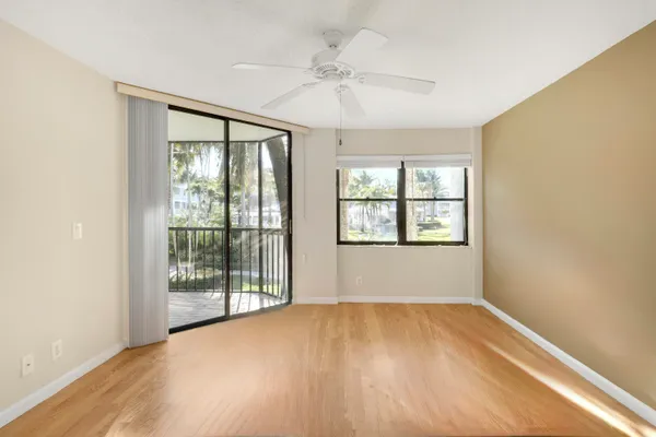 a living room with fireplace furniture and a flat screen tv