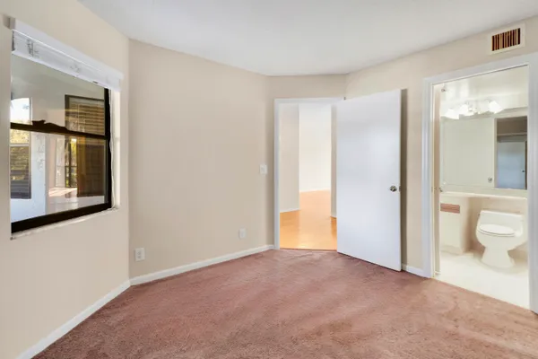 a kitchen with stainless steel appliances a refrigerator stove microwave and sink