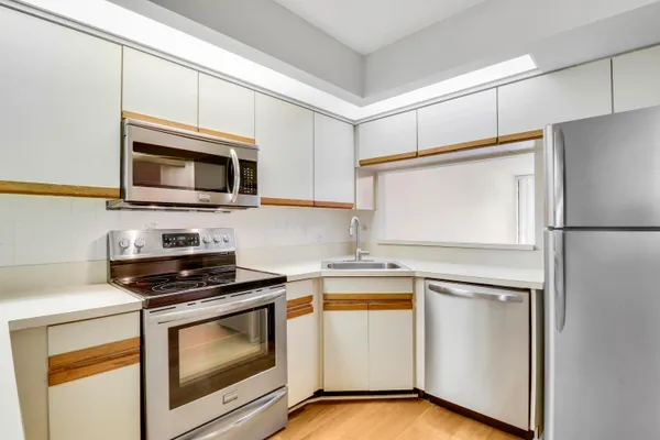 a view of a room that has a large window