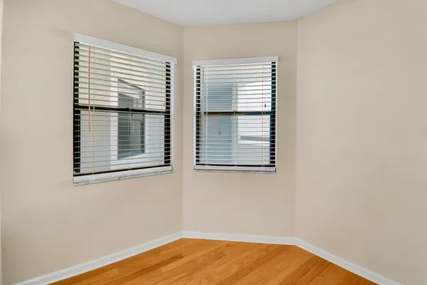 a view of a pathway both side of the house
