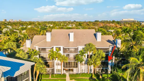 a room with gym equipment and a flat screen tv