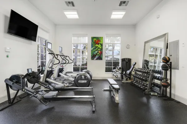 an aerial view of residential building with trees