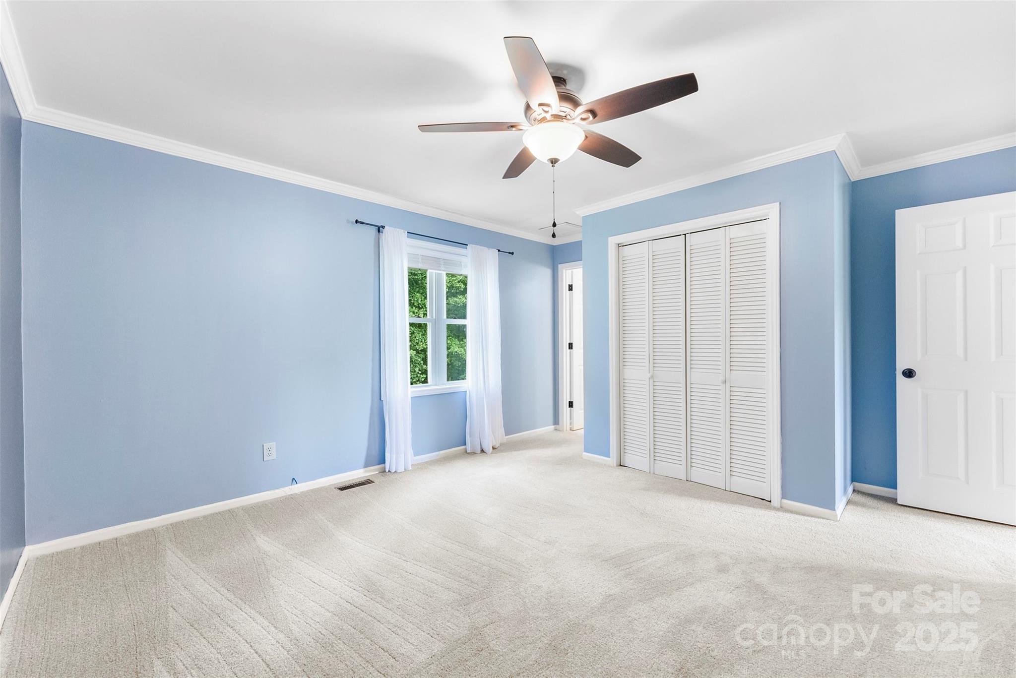 213 Press Sweezy Road Kings Mountain, NC 28086 - Photo 14 of 43 a view of a livingroom with a ceiling fan and window