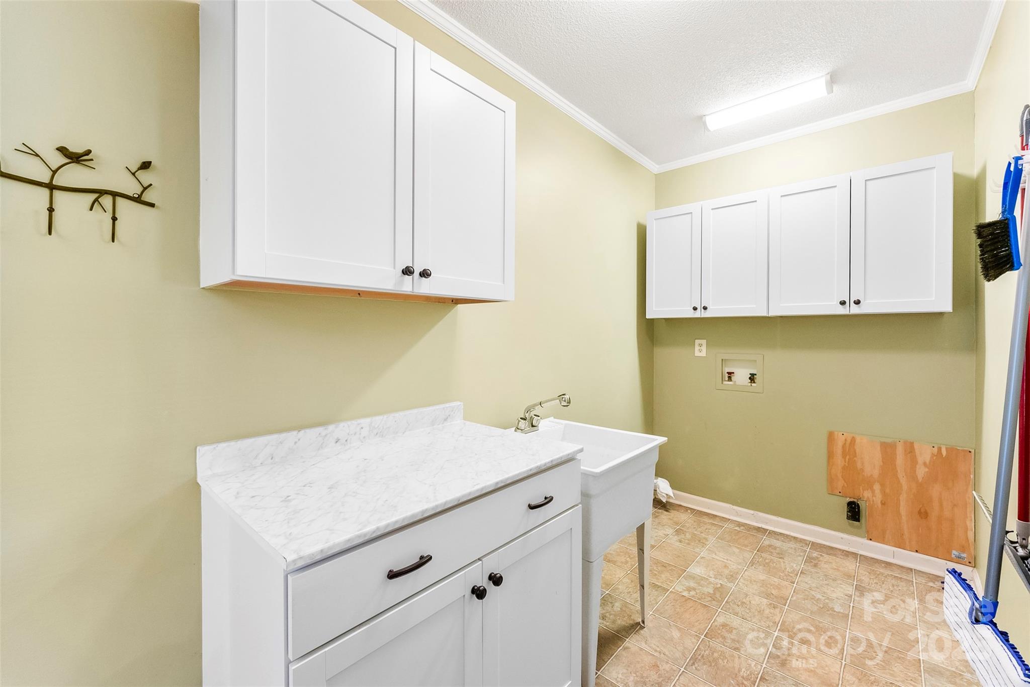 213 Press Sweezy Road Kings Mountain, NC 28086 - Photo 16 of 43 a room with a sink cabinets and utility