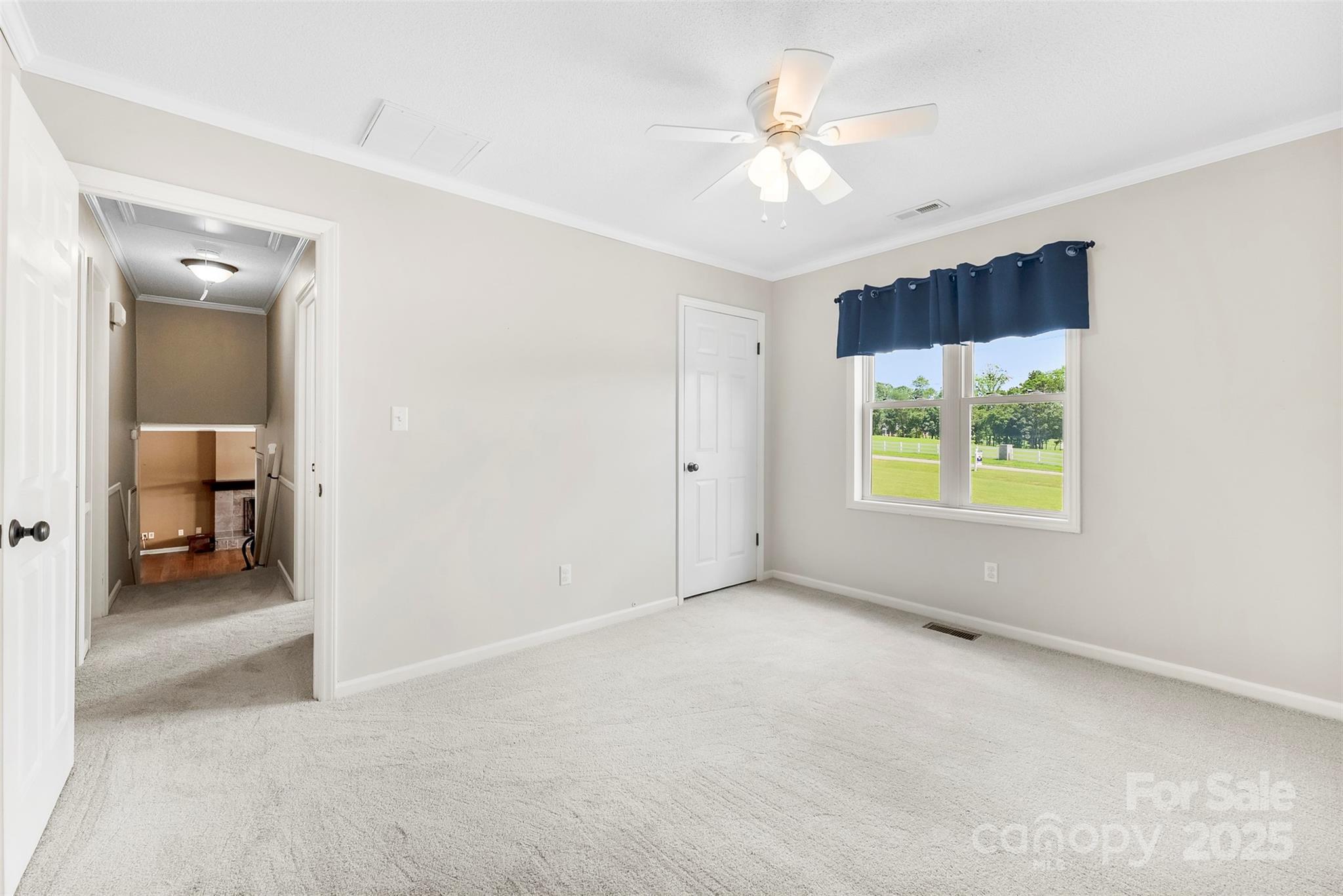 213 Press Sweezy Road Kings Mountain, NC 28086 - Photo 17 of 43 an empty room with windows and closet