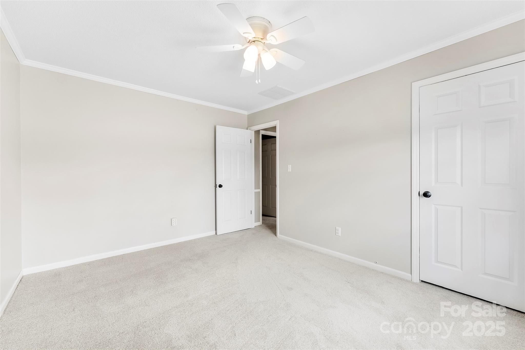 213 Press Sweezy Road Kings Mountain, NC 28086 - Photo 19 of 43 an empty room with a ceiling fan and a window