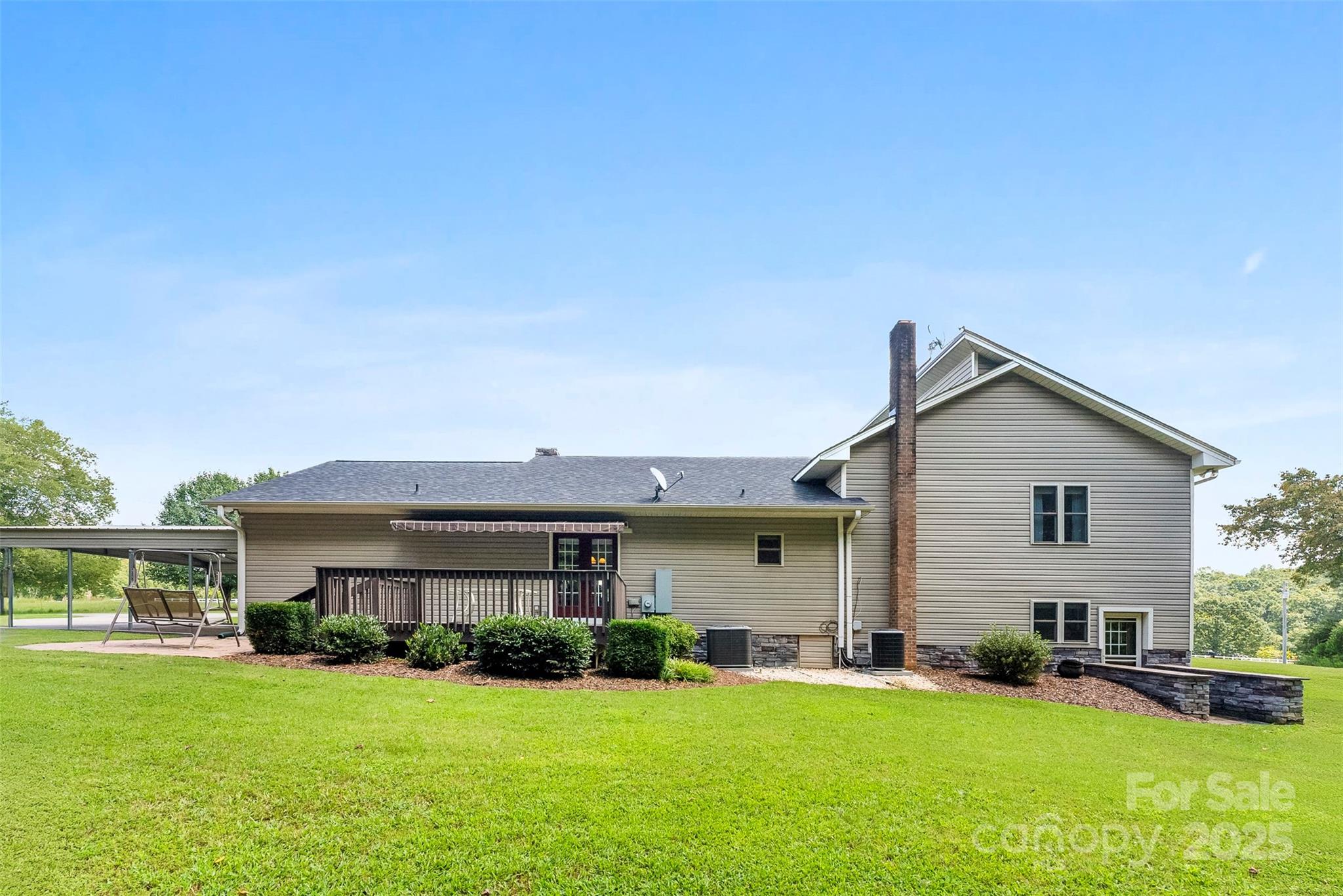 213 Press Sweezy Road Kings Mountain, NC 28086 - Photo 34 of 43 a front view of a house with a yard and garage