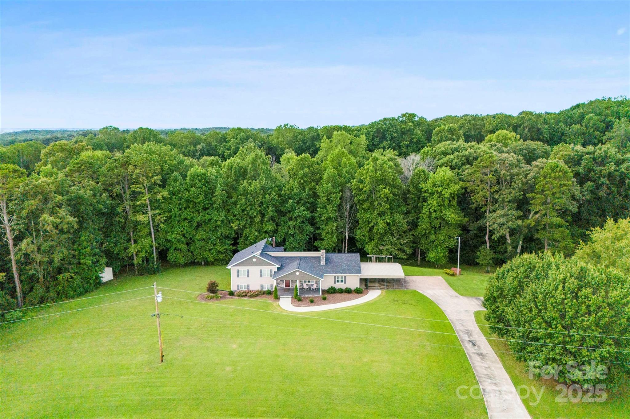 213 Press Sweezy Road Kings Mountain, NC 28086 - Photo 40 of 43 a view of a garden with a large trees