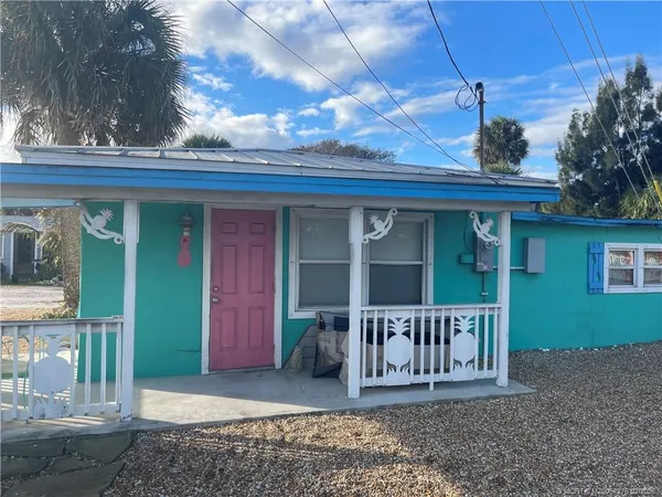 a view of a house with a deck