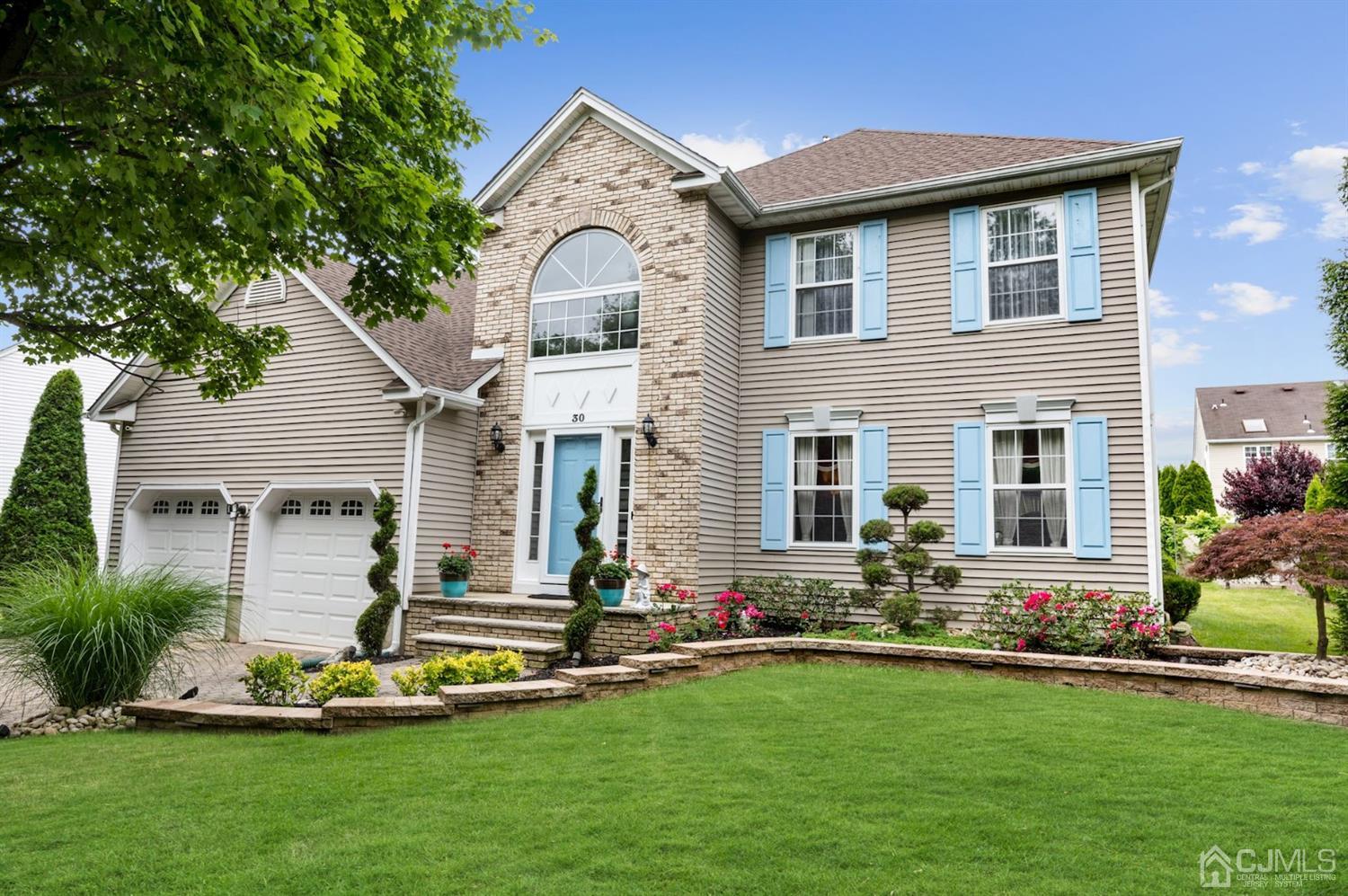 30 Brandywine Drive Old Bridge, NJ 07747 - Photo 2 of 39 a front view of house with yard and outdoor seating