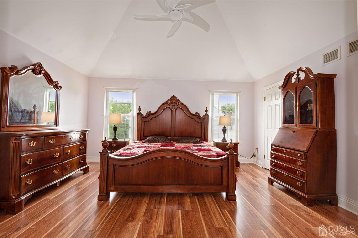 30 Brandywine Drive Old Bridge, NJ 07747 - Photo 12 of 39 a bedroom with a bed and wooden floor