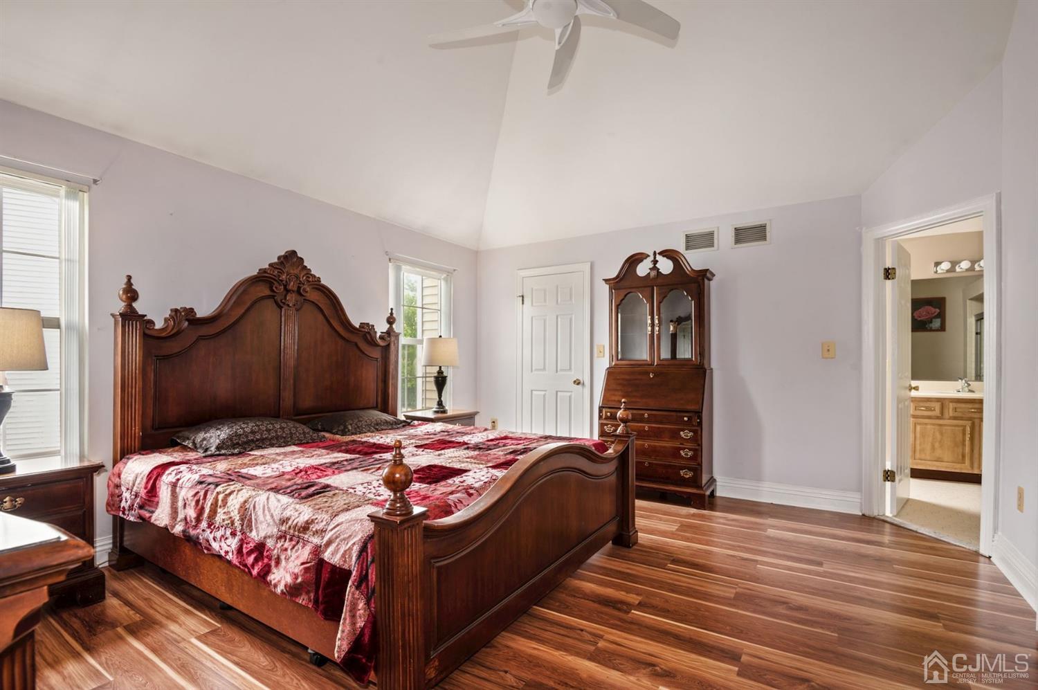 30 Brandywine Drive Old Bridge, NJ 07747 - Photo 13 of 39 a bedroom with a bed and wooden floor