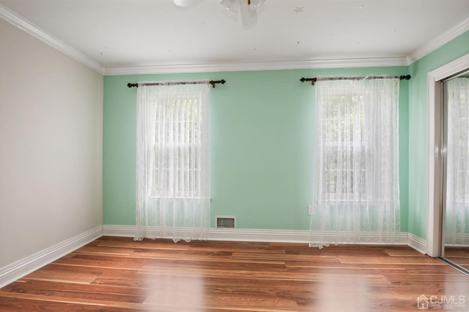30 Brandywine Drive Old Bridge, NJ 07747 - Photo 17 of 39 a view of a room with wooden floor and windows