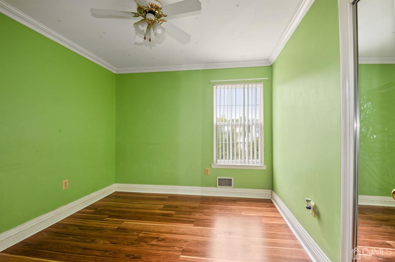 30 Brandywine Drive Old Bridge, NJ 07747 - Photo 19 of 39 a view of a room with window and wooden floor