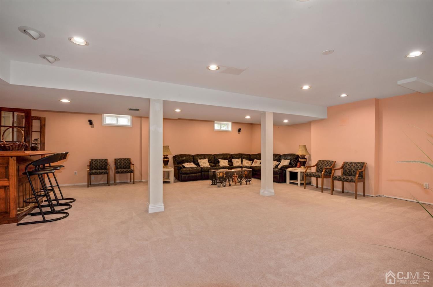 30 Brandywine Drive Old Bridge, NJ 07747 - Photo 23 of 39 a view of a room with gym equipment and a large window