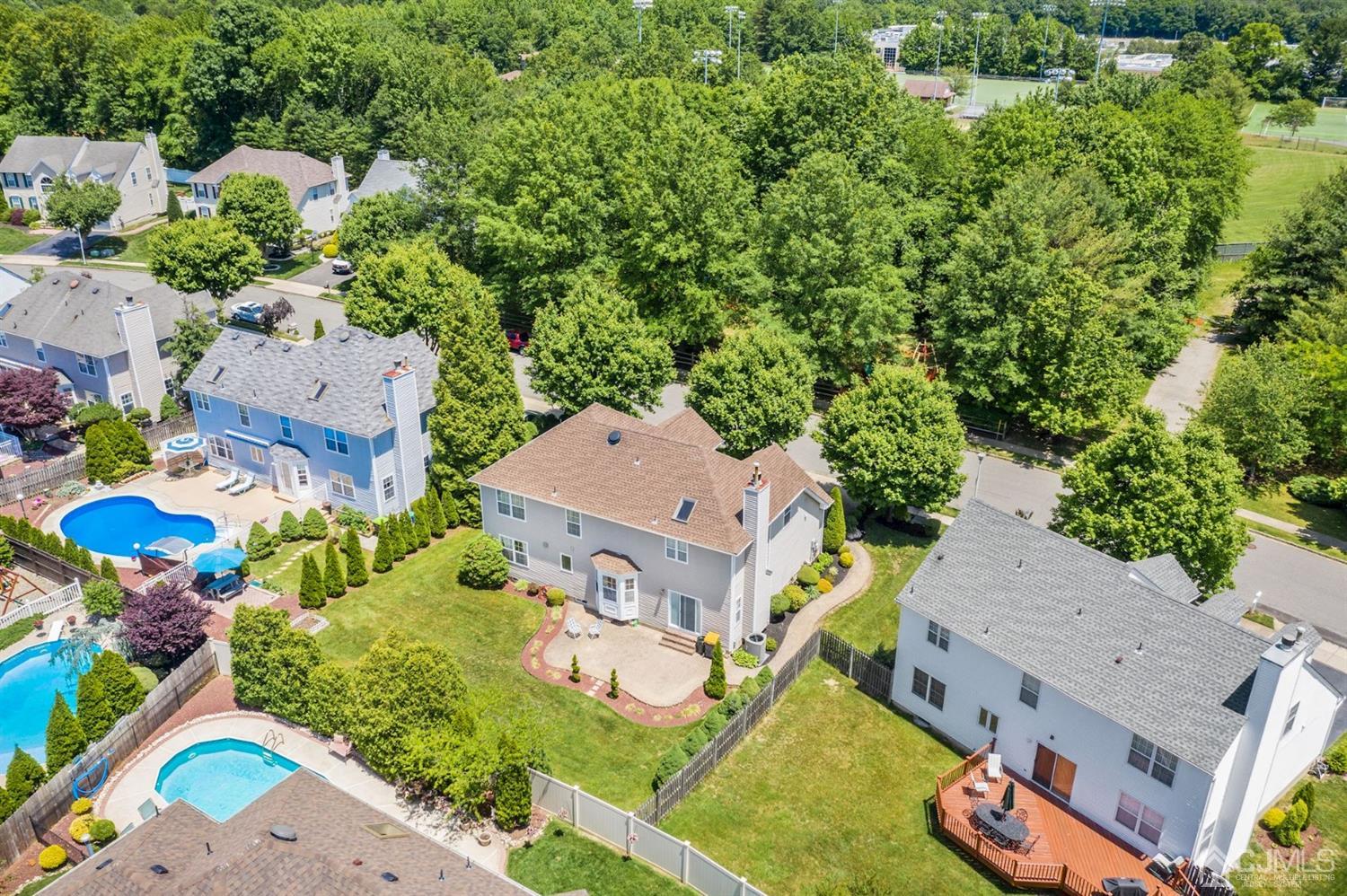 30 Brandywine Drive Old Bridge, NJ 07747 - Photo 28 of 39 an aerial view of a house with a yard basket ball court and outdoor seating