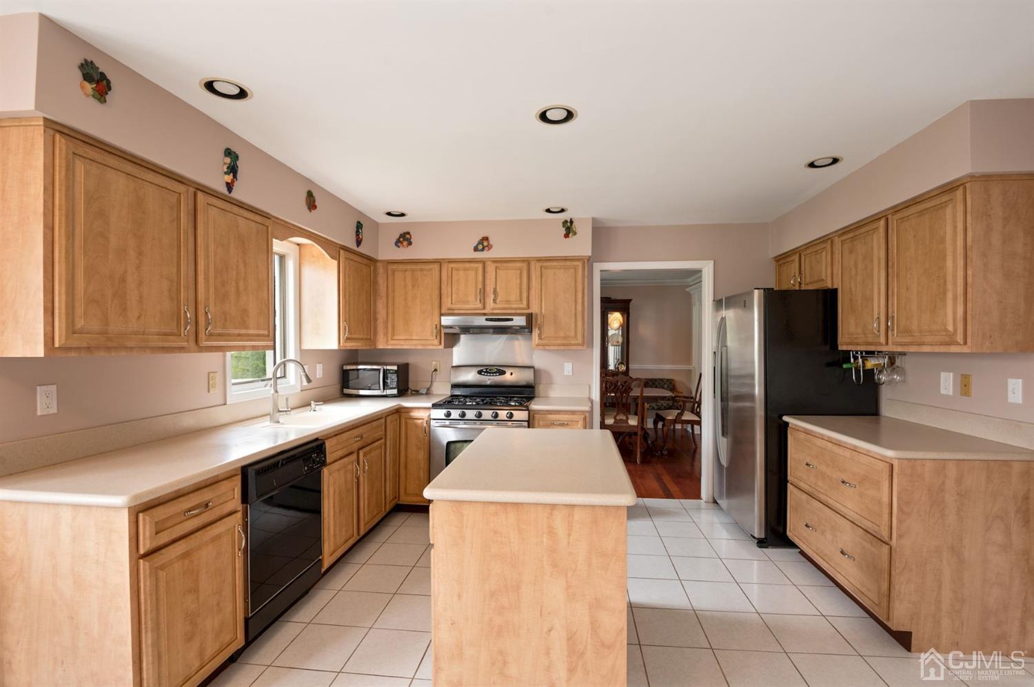 30 Brandywine Drive Old Bridge, NJ 07747 - Photo 4 of 39 a large kitchen with stainless steel appliances lots of counter space sink and cabinets