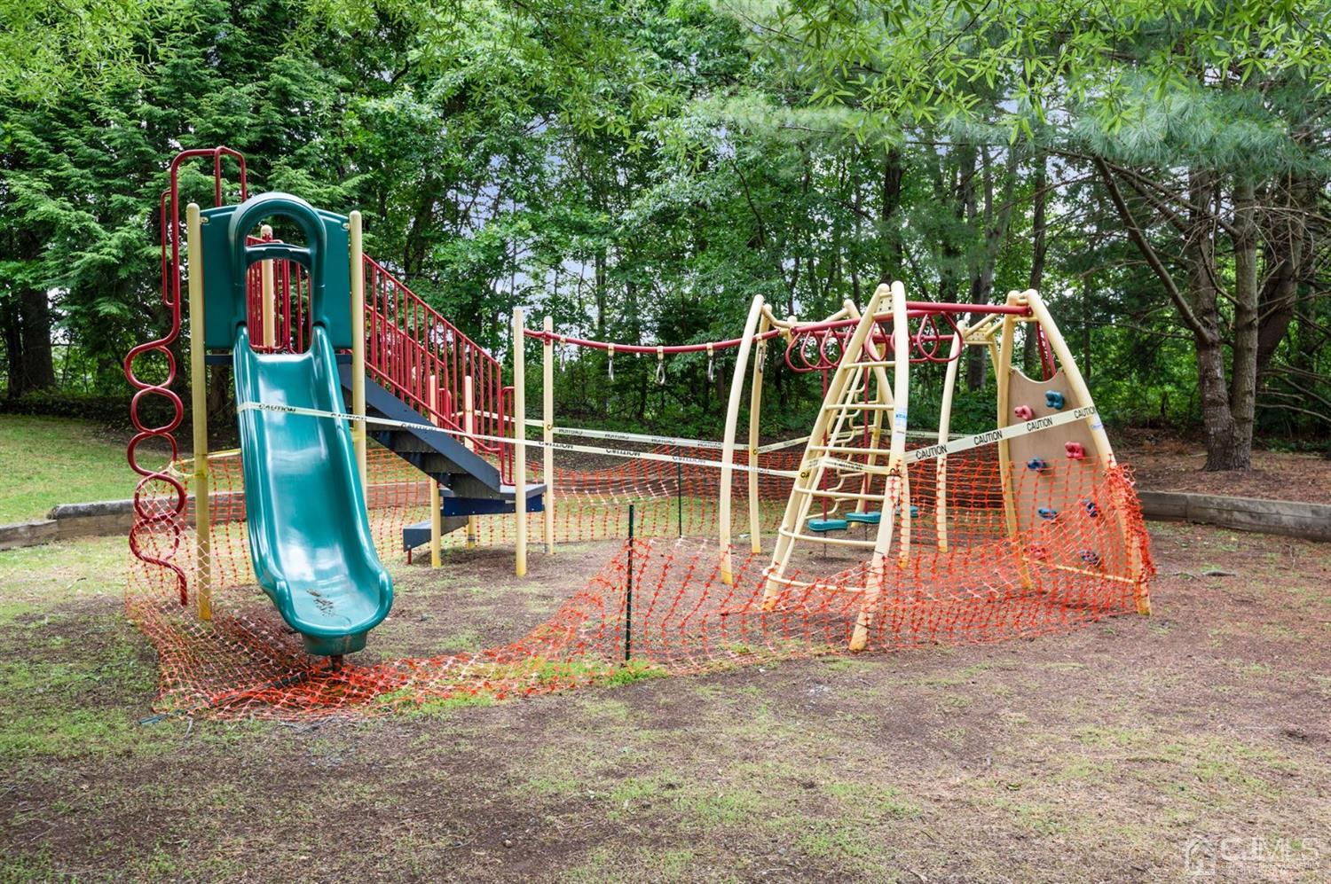 30 Brandywine Drive Old Bridge, NJ 07747 - Photo 35 of 39 a view of outdoor space with swings and slides
