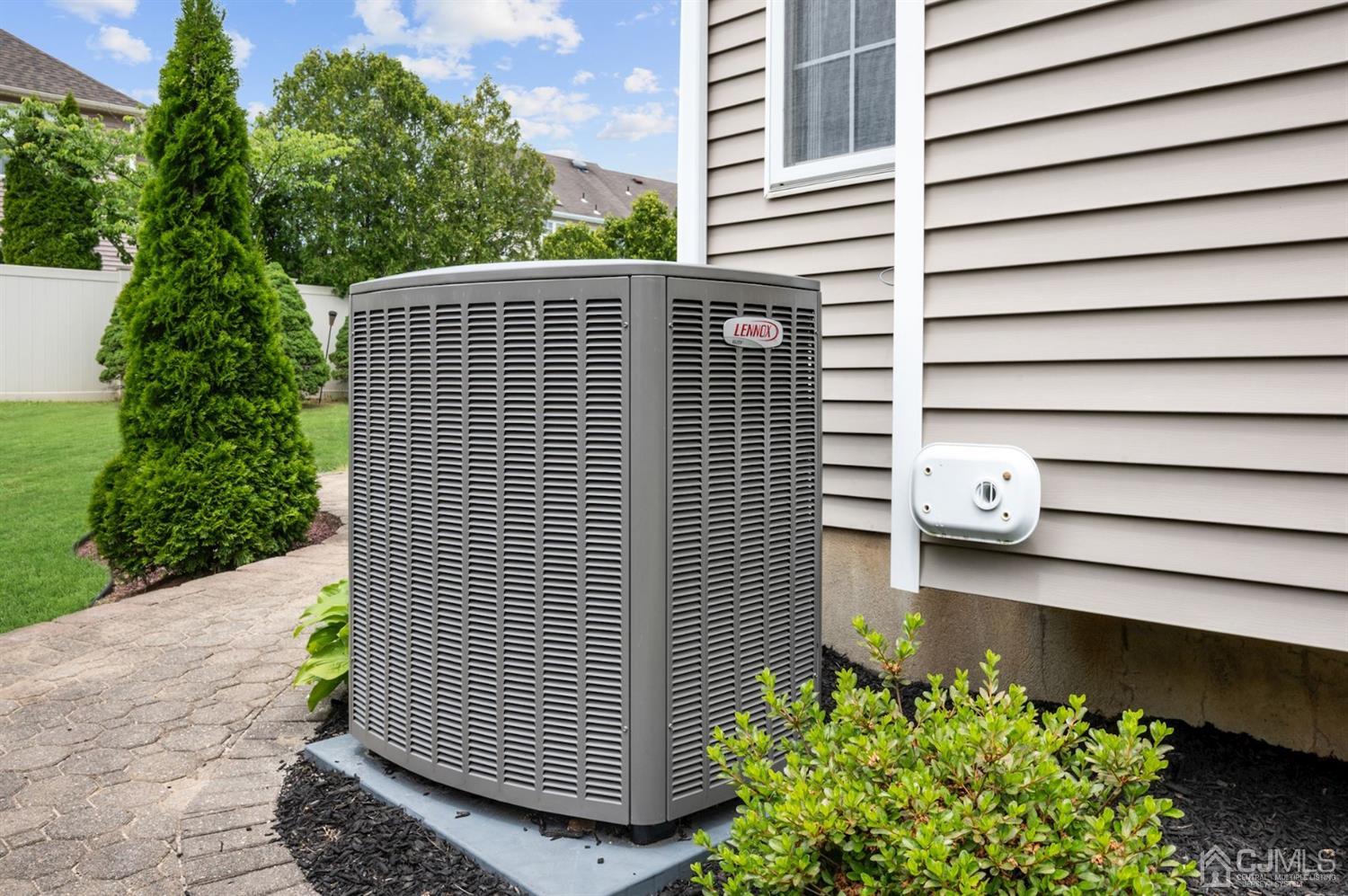 30 Brandywine Drive Old Bridge, NJ 07747 - Photo 38 of 39 a front view of a house with a garden