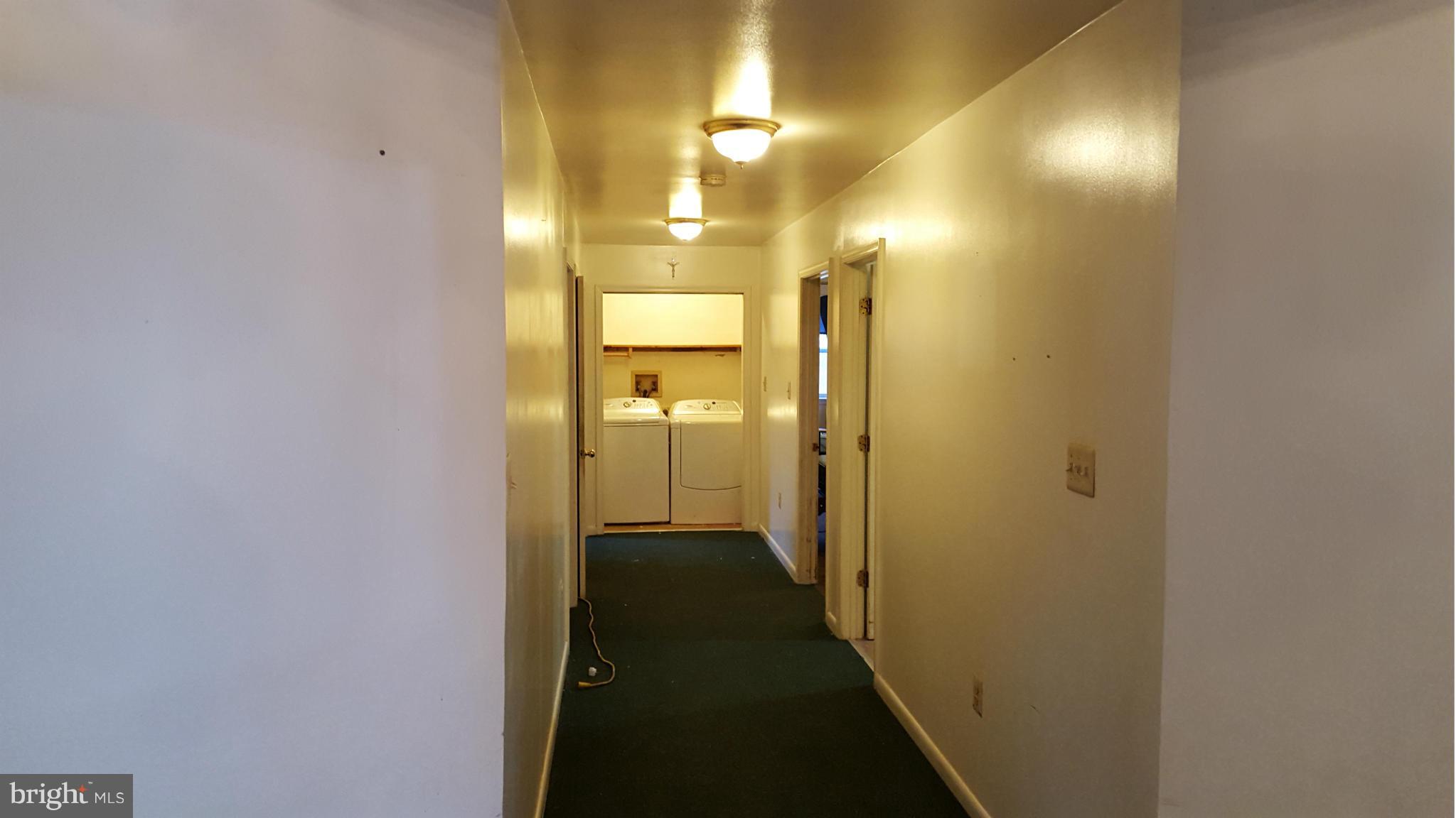 1238 Fridinger Mill Road Westminster, MD 21157 - Photo 14 of 22 Wide Hallway to Bedrooms & Laundry on Main
