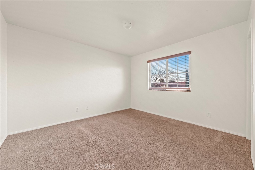 4660 Spice Street Lancaster, CA 93536 - Photo 30 of 42 an empty room with a empty space and window