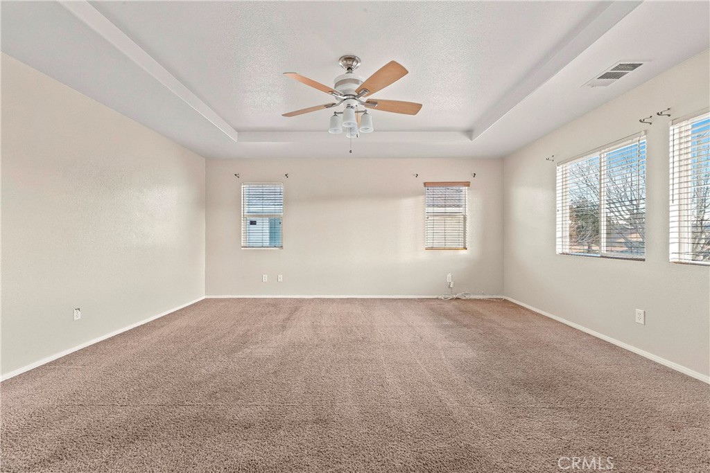 4660 Spice Street Lancaster, CA 93536 - Photo 32 of 42 a view of an empty room with a window