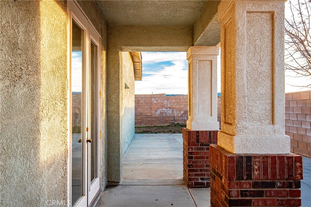 4660 Spice Street Lancaster, CA 93536 - Photo 39 of 42 a view of a balcony with furniture and city view
