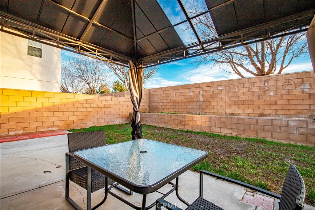 4660 Spice Street Lancaster, CA 93536 - Photo 40 of 42 a view of an outdoor kitchen